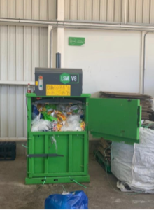 Cardboard waste baler