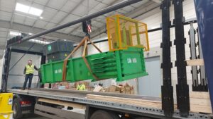 The H50 Horizontal Baler being delivered on site: